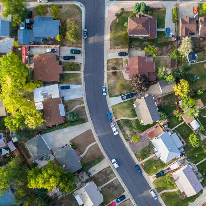 An aerial view of a neighborhood filled with houses.